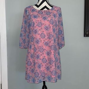 pink and blue floral patterned dress